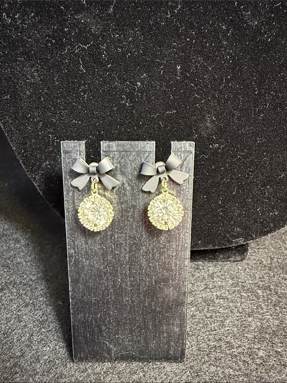Gold Floral Medallion Drop Earrings with Gray Bow Accent
